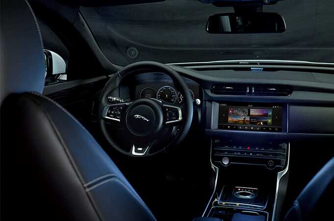Jaguar XF steering wheel, dashboard and control center.