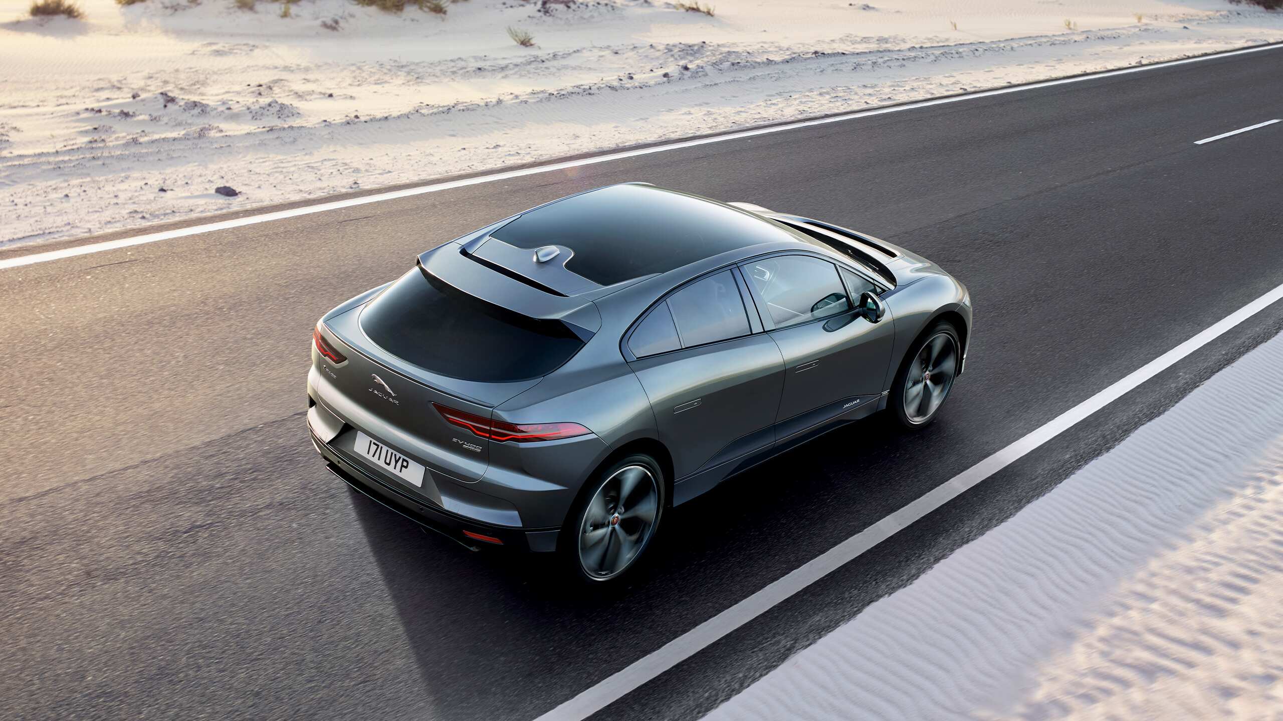 Jaguar I PACE running on desert road